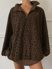 Oversized leopard quarter zip sweatshirt front view with dropped shoulders and roomy sleeves
