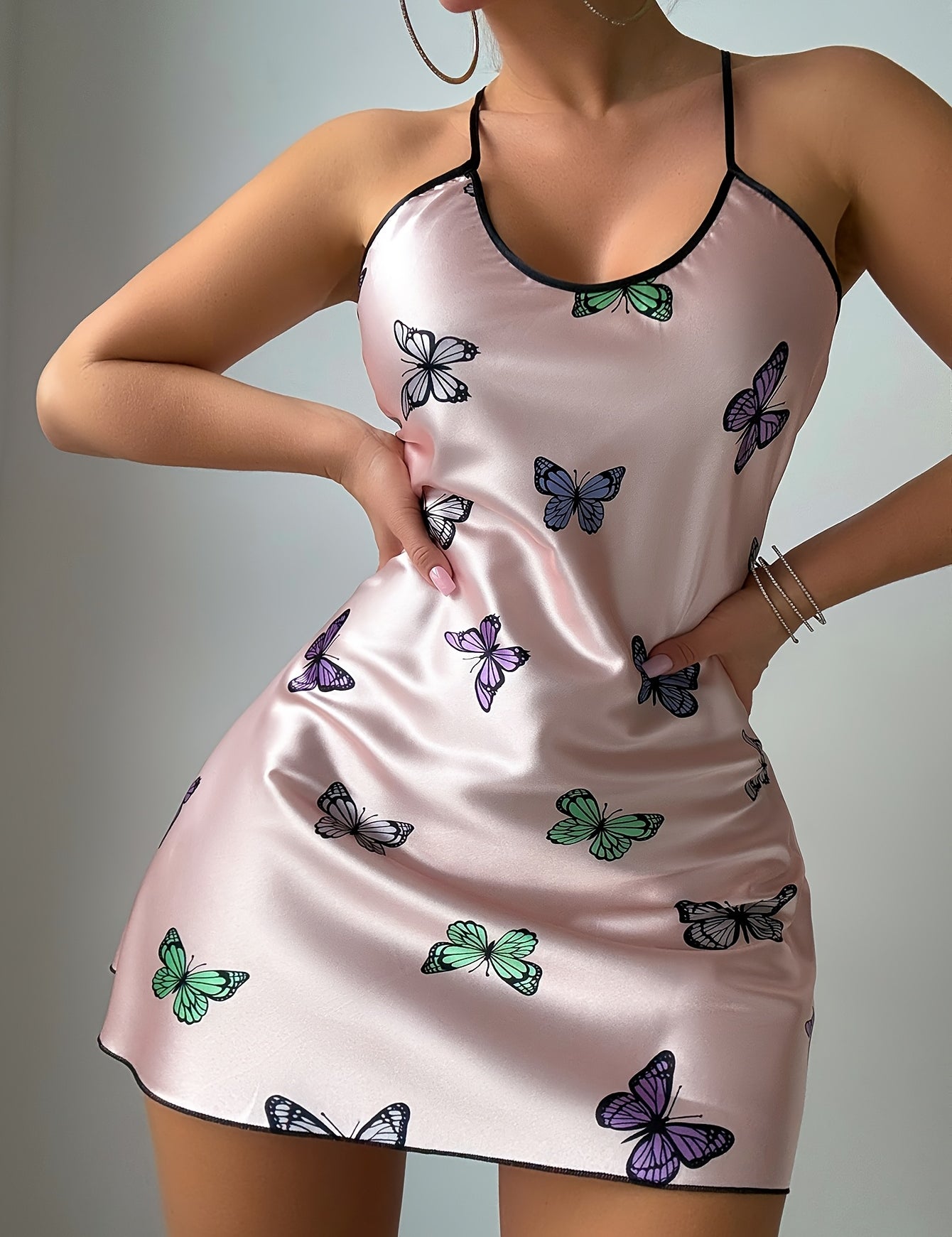 Blush pink butterfly print satin chemise, front view with black contrast trim