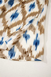 Women's midi dress in abstract print, v-neck sleeveless