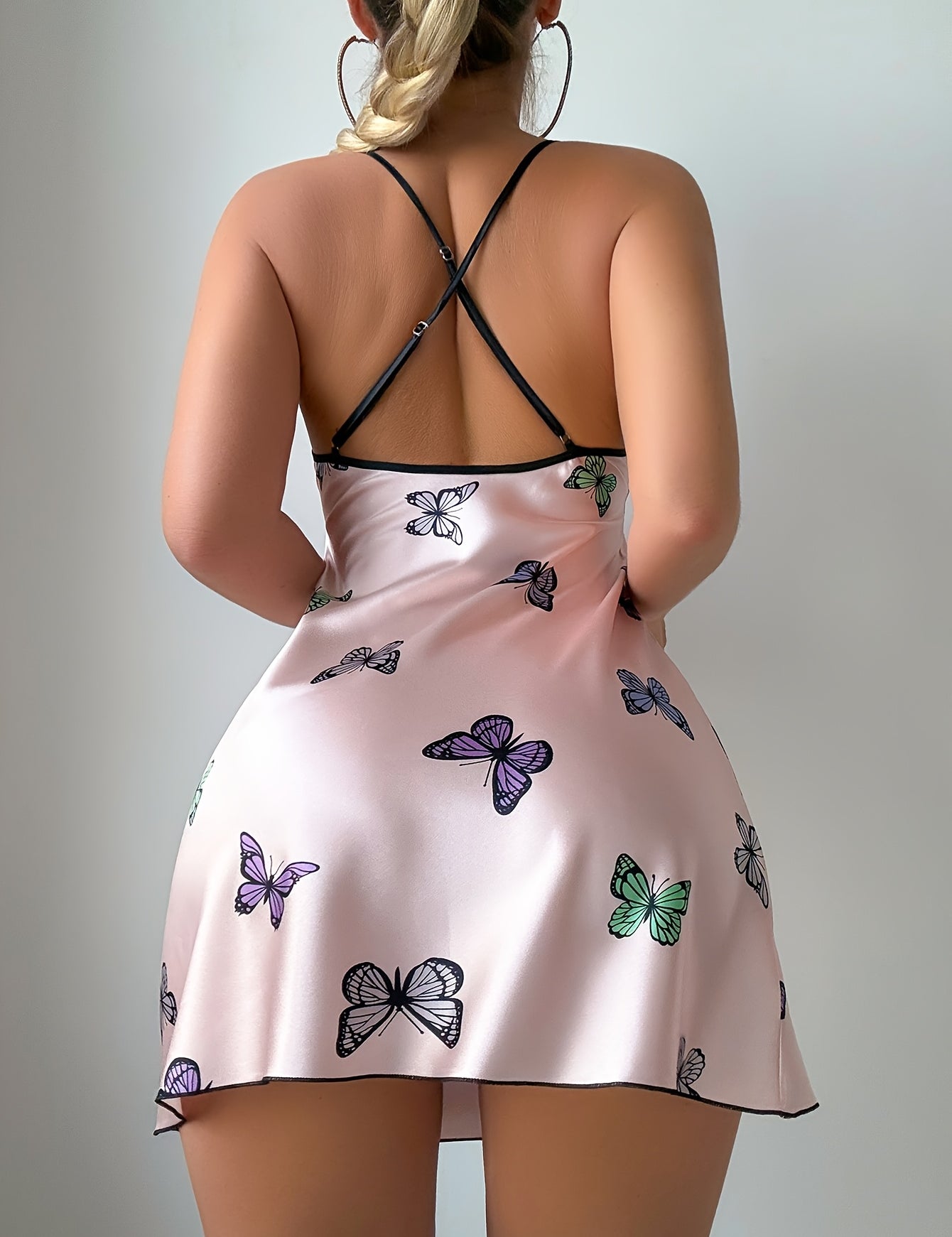 Butterfly print satin chemise back view showing the adjustable cross-over straps
