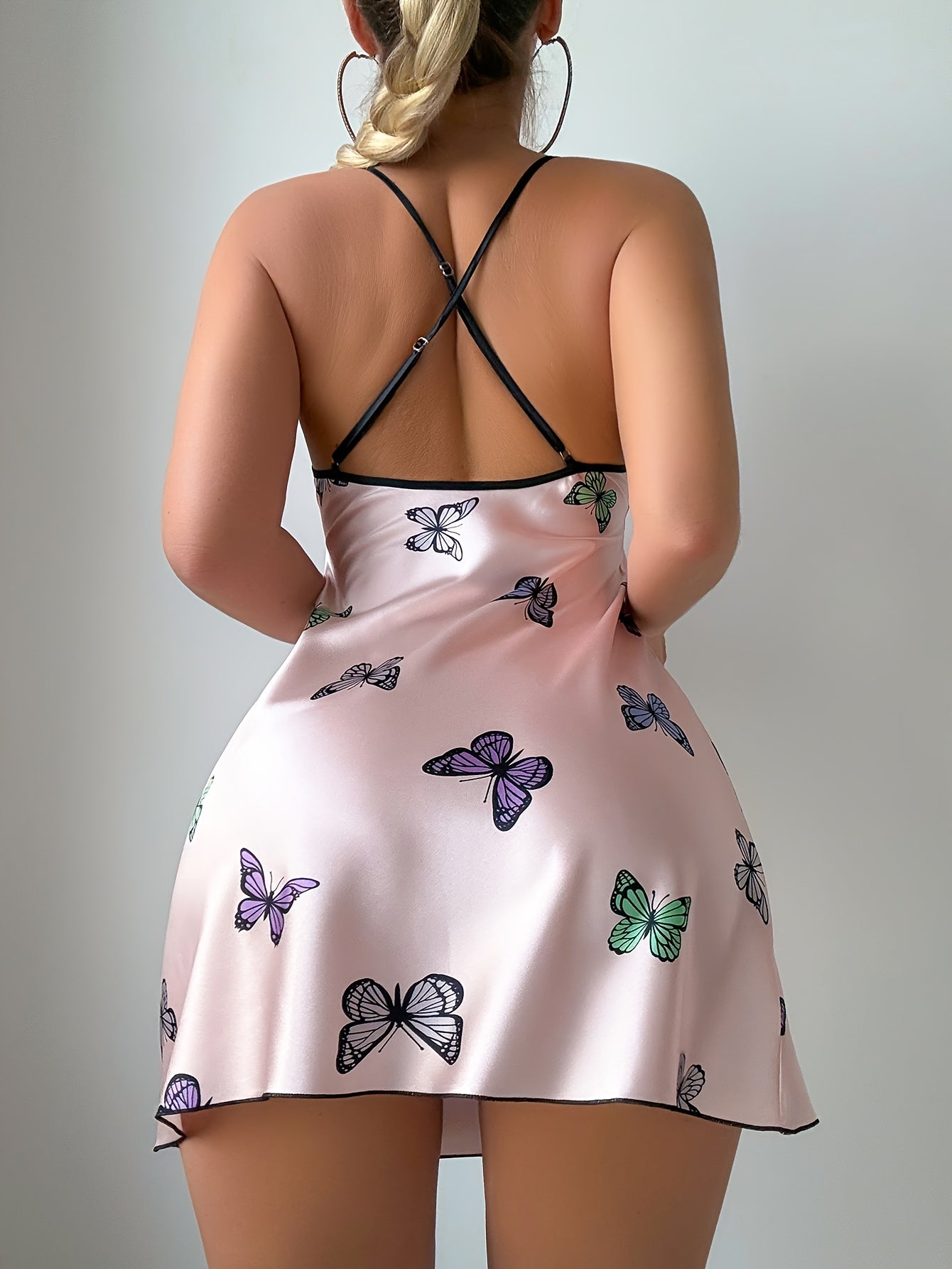Butterfly print satin chemise back view showing the adjustable cross-over straps