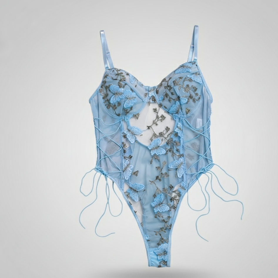 Blue lace lingerie set on a light gray background