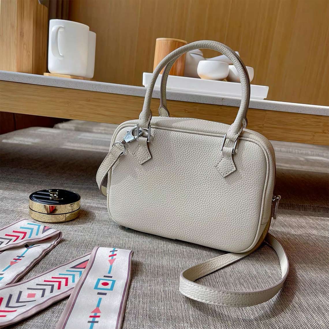 Inspired-mini-plume-bag-1.jpg