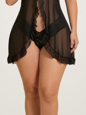 Close-up of the ruffled hem and sheer mesh panel on the black babydoll slip - Chaotic Fashion