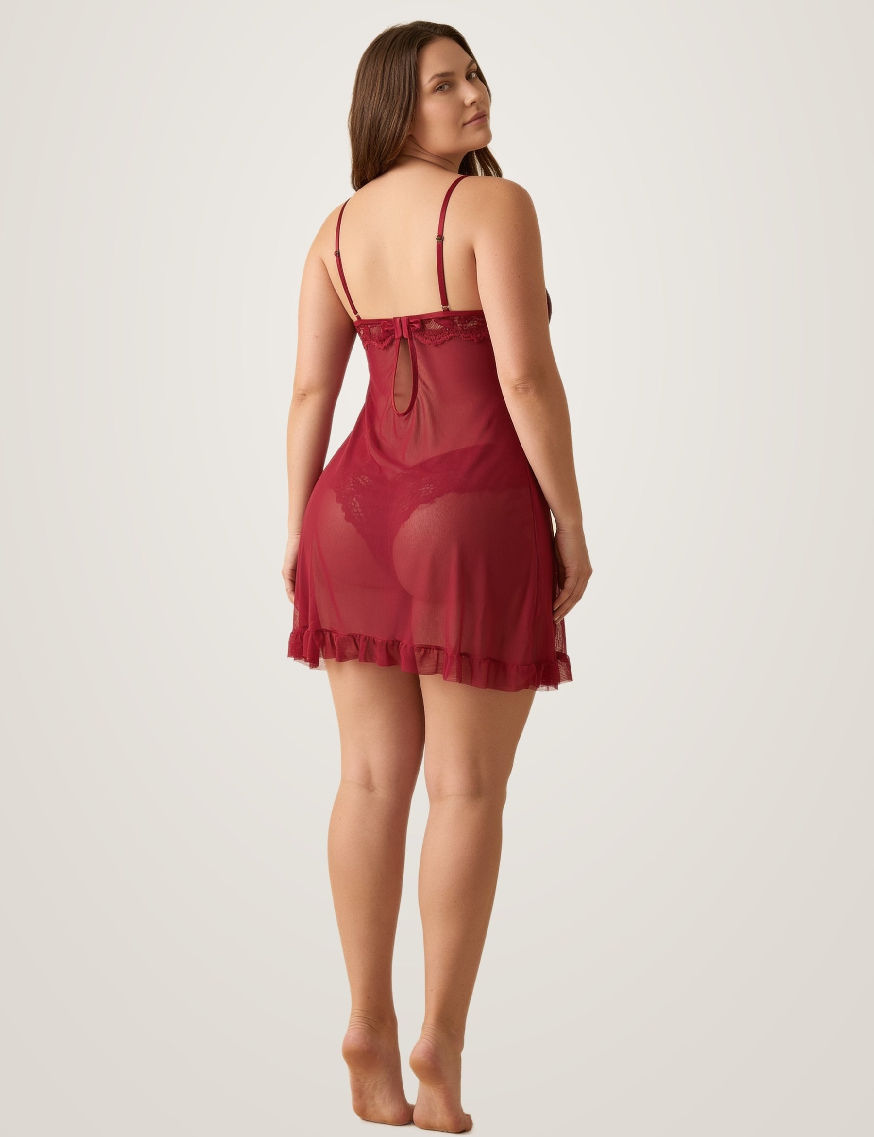 Back view of the red sheer babydoll slip showing the keyhole back, satin bow and adjustable straps - Chaotic Fashion