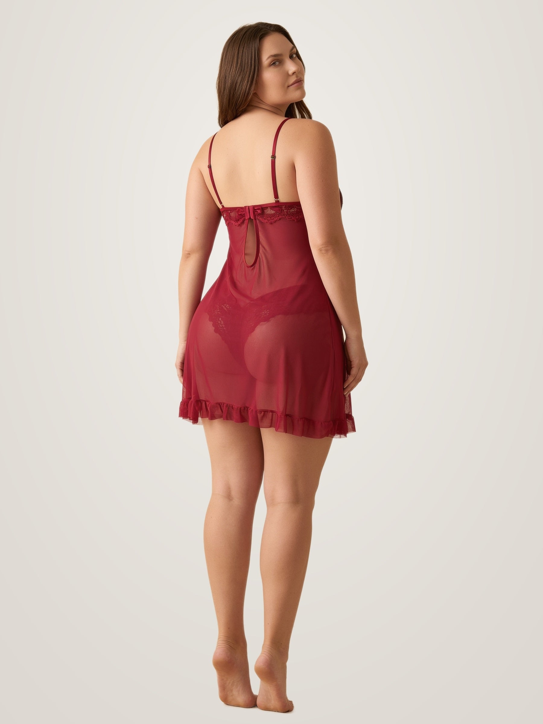 Back view of the red sheer babydoll slip showing the keyhole back, satin bow and adjustable straps - Chaotic Fashion