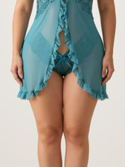 Close-up of the ruffled hem and sheer mesh panel on the teal babydoll slip - Chaotic Fashion
