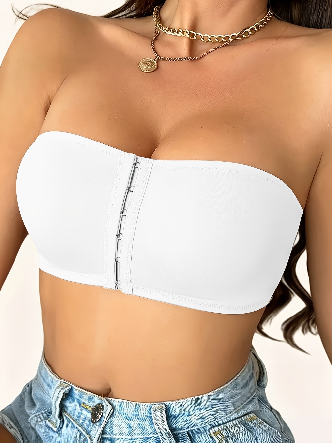 Strapless push up bra in white, front view showing the shaped push-up cups