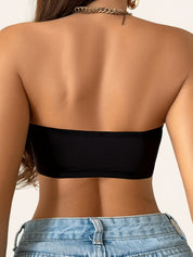 Strapless push up bra in black, back view showing the smooth strapless band