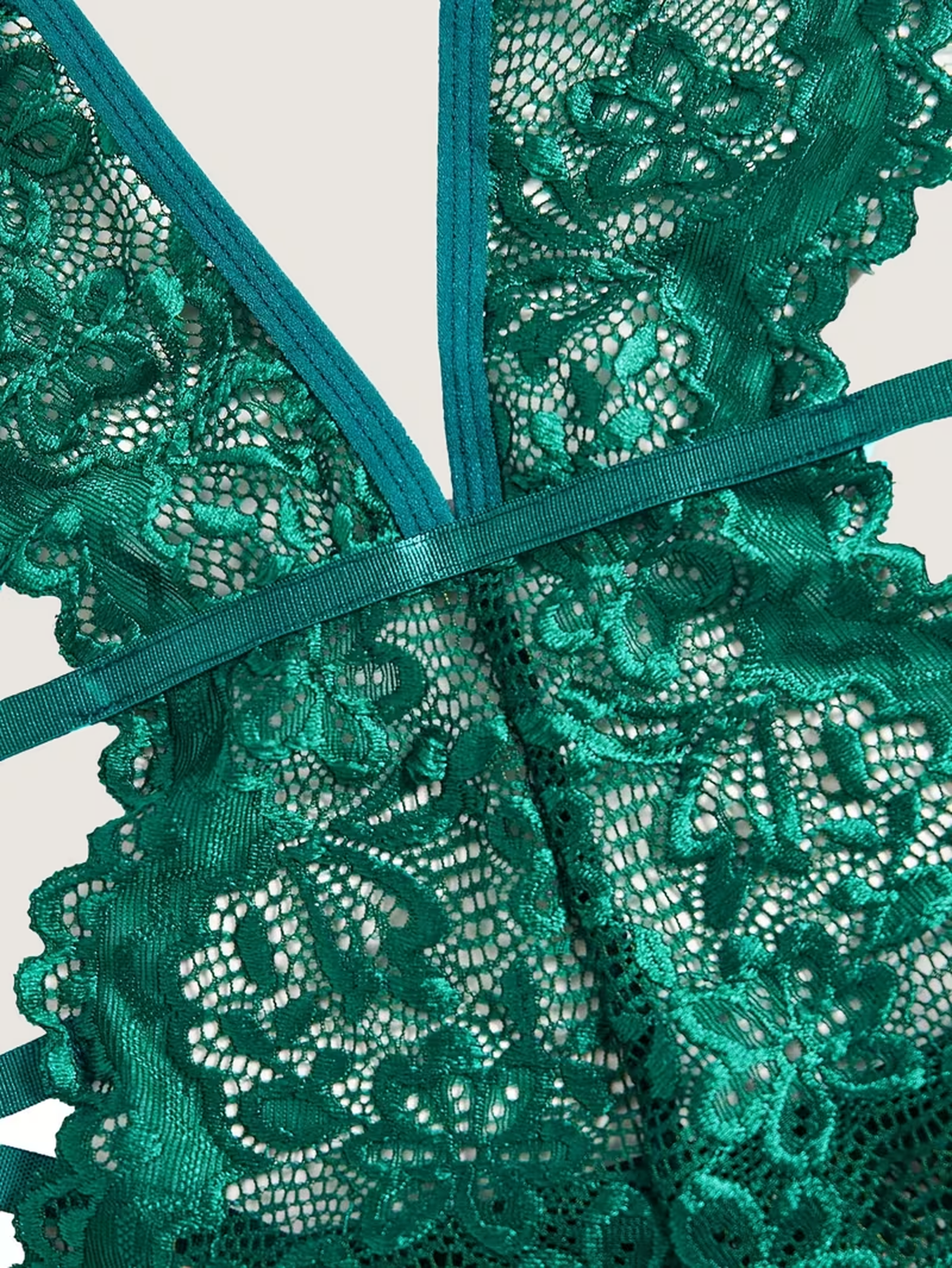 Macro of the emerald floral lace weave