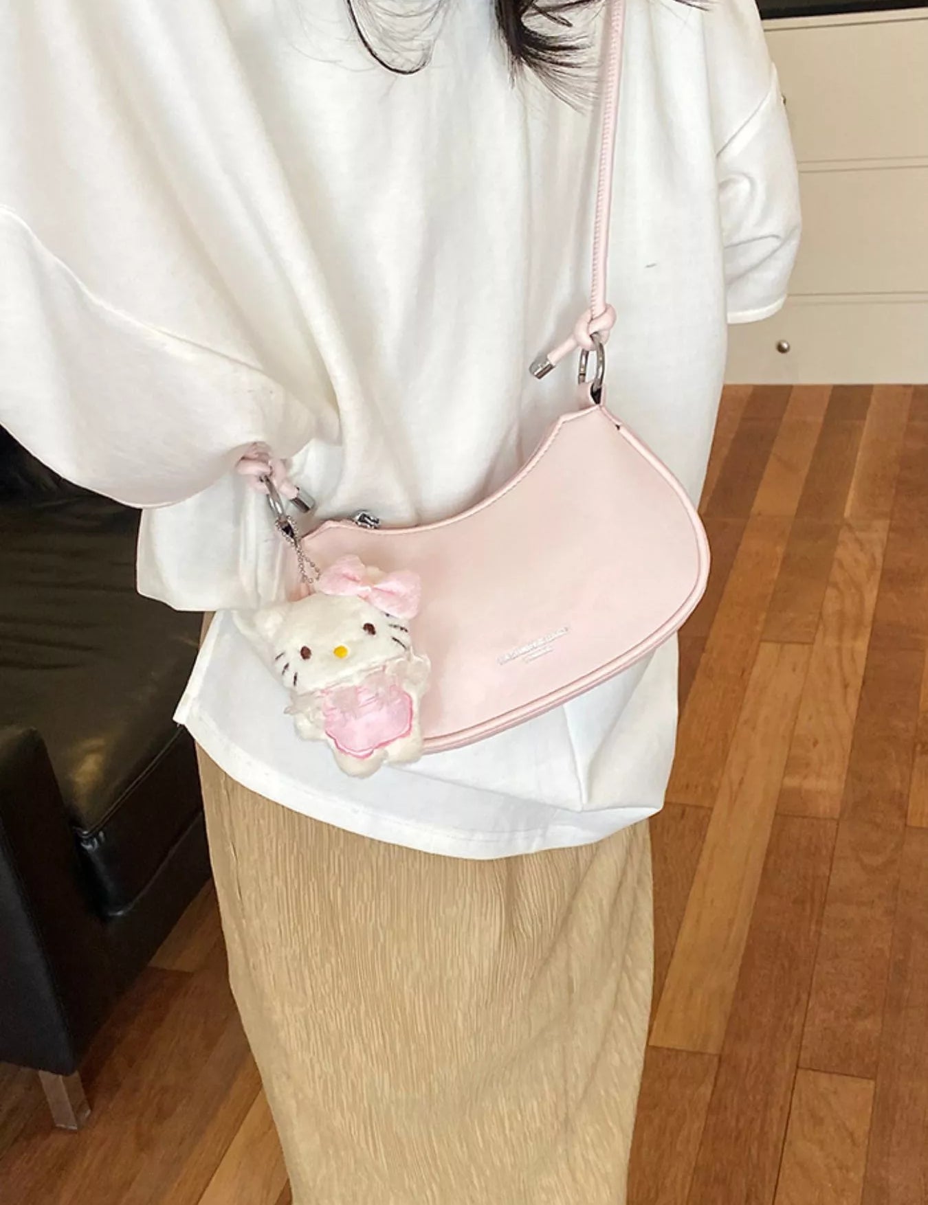 Women's Small crossbody bag in vegan leather, knot strap detail, pink