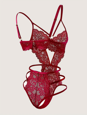 Red backless lace teddy at three-quarter angle