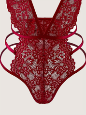 Red lace bodysuit hip strap and thong detail